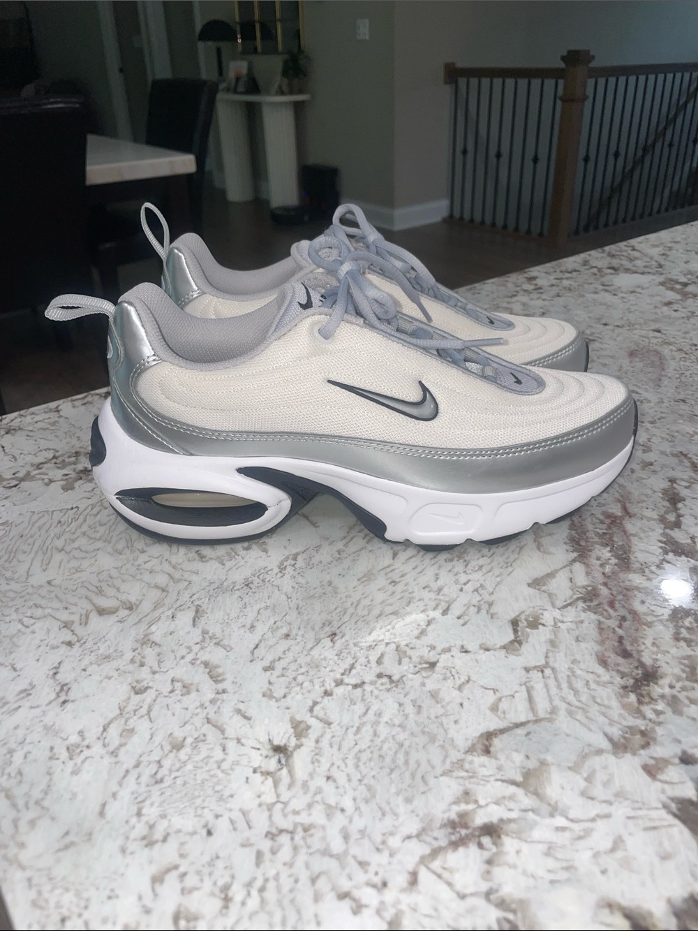 Nike Women’s White and Silver Air-Cushioned Athletic Sneakers